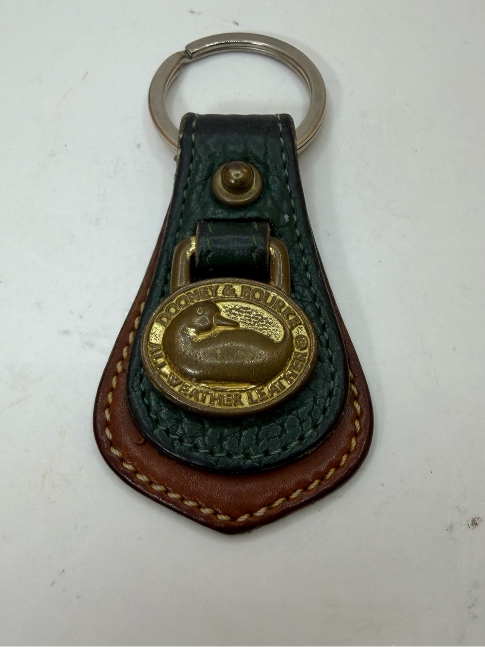 Dooney & Bourke Green and Brown Leather Key Fob with Brass Duck Medallion